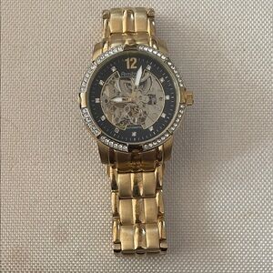 Armitron Gold Watch with Black Skeleton Dial